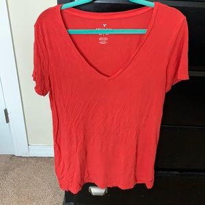 Red V-neck tee